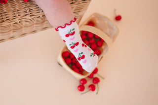 White socks with red cherries and pink hearts
