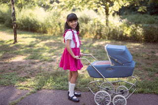 Pink corduroy pinafore skirt for baby toddler girls