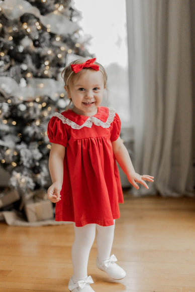 girl in red velvet dress