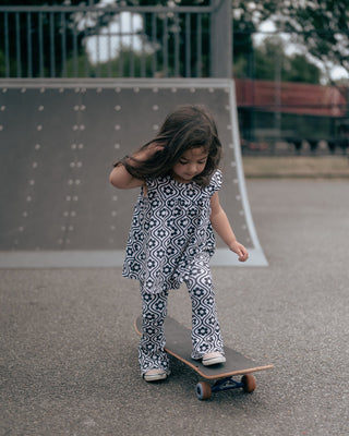 black and cream flower bell bottom pants - toddler pants
