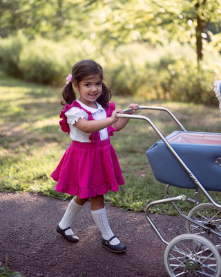 Pink corduroy pinafore skirt for baby toddler girls