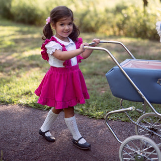 Pink corduroy pinafore skirt for baby toddler girls