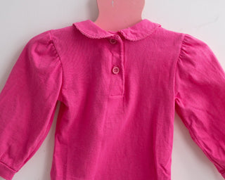 Pink baby bodysuit