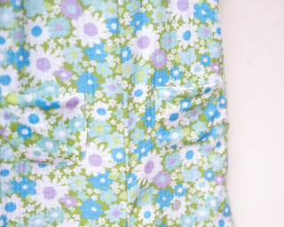 blue and green flower power double gauze romper